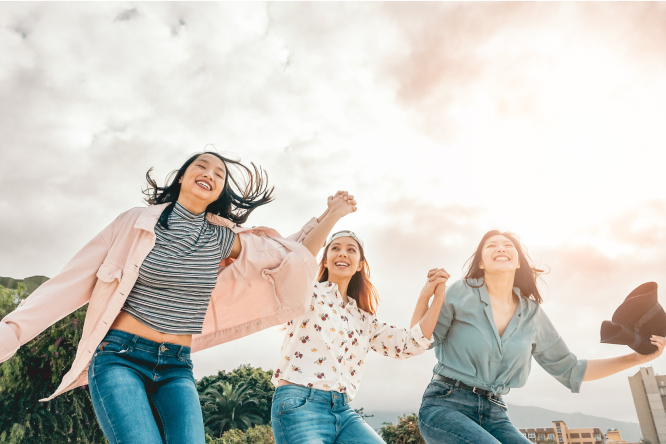 Girls happily dancing