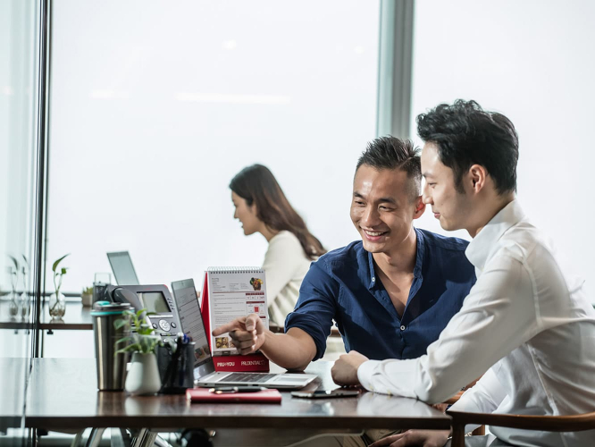 Two guys having work discussion